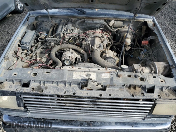 1991 Ford Ranger with VIN 1FTCR11T9MTA00875, listed as a Copart auction lot 45155865 with 22,591 mi miles and Salvage Title. Bid and sale history available at DreamBid. Image 11.