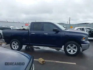 2015 Ram 1500 Outdoorsman z VIN 1C6RR7GT6FS508211, wystawiony jako IAAI lot #42044889 z przebiegiem 125 774 mil mil oraz . Historia ofert i sprzedaży dostępna na DreamBid. Obrazek 13.