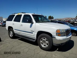 2004 GMC Yukon SLE with VIN 1GKEK13T54J168734, listed as a Copart auction lot 71235204 with 174,429 mi miles and Salvage Title. Bid and sale history available at carsss.com. Image 4.