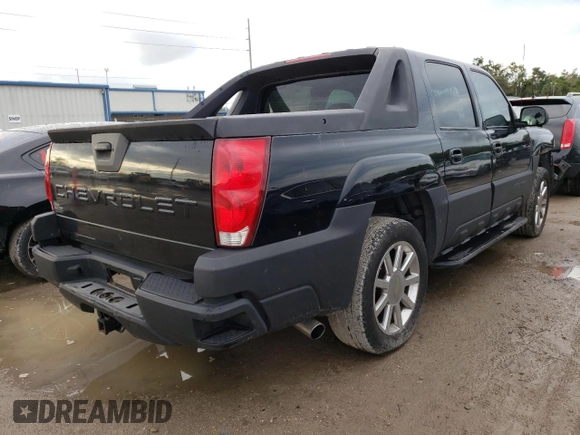 2002 Chevrolet Avalanche with VIN 3GNEC13TX2G104249, listed as a Copart auction lot 62910112 with 217,614 mi miles and Salvage title. Bid and sale history available at DreamBid. Image 4.