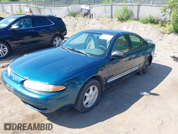 2003 Oldsmobile Alero GL1 z VIN 1G3NL52F53C153441, wystawiony jako IAAI lot #39799738 z przebiegiem 180 025 mil mil oraz . Historia ofert i sprzedaży dostępna na DreamBid. Obrazek 2.