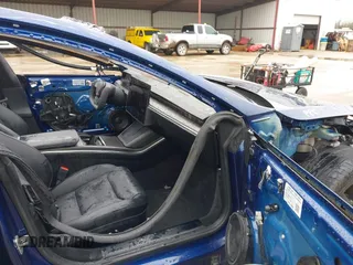 2021 Tesla Model S Plaid with VIN 5YJSA1E60MF440042, listed as a IAAI auction lot 41563347 with 40,981 mi miles. Bid and sale history available at carsss.com. Image 5.