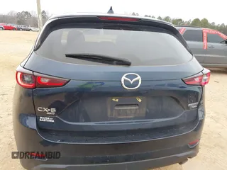 2022 Mazda CX-5 2.5 Turbo with VIN JM3KFBAY5N0521947, listed as a IAAI auction lot 41424202 with 43,961 mi miles and . Bid and sale history available at carsss.com. Image 16.