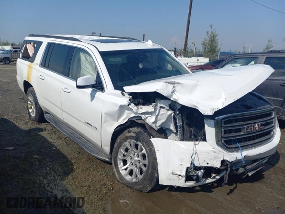 2019 GMC Yukon XL SLT with VIN 1GKS2GKC1KR279755, listed as a Copart auction lot 64695394 with 0 mi miles and Salvage Title. Bid and sale history available at carsss.com. Image 4.