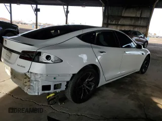2019 Tesla Model S 100D with VIN 5YJSA1E45KF330633, listed as a Copart auction lot 49329745 with 74,047 mi miles and Salvage title. Bid and sale history available at DreamBid. Image 3.