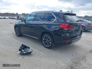 2017 BMW X5 xDrive35i with VIN 5UXKR0C36H0V77999, listed as a IAAI auction lot 41867766 with 98,222 mi miles. Bid and sale history available at carsss.com. Image 3.