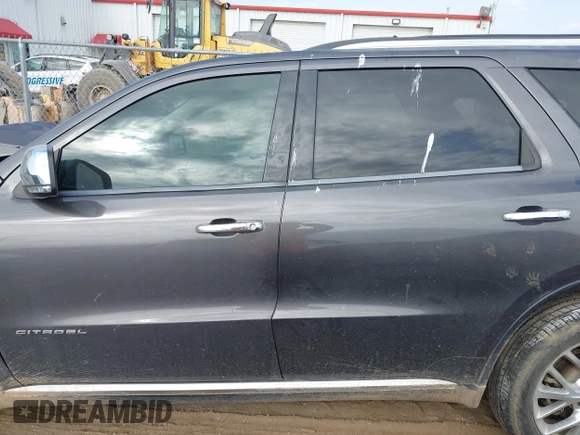 2014 Dodge Durango Citadel with VIN 1C4RDHEG2EC381324, listed as a IAAI auction lot 42021611 with 104,178 mi miles and . Bid and sale history available at DreamBid. Image 14.