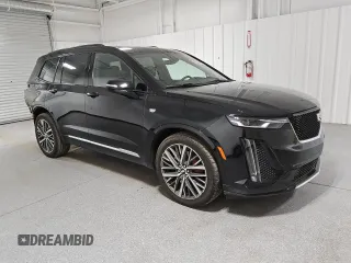 2023 Cadillac XT6 AWD Sport z VIN 1GYKPGRS3PZ133580, wystawiony jako Copart lot #44825095 z przebiegiem 12 168 mil mil oraz Czysty tytuł • Clean title. Historia ofert i sprzedaży dostępna na DreamBid. Obrazek 4.