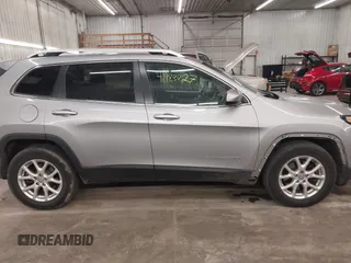 2014 Jeep Cherokee Altitude with VIN 1C4PJMCB9EW149754, listed as a IAAI auction lot 41983427 with 199,810 mi miles and . Bid and sale history available at DreamBid. Image 14.