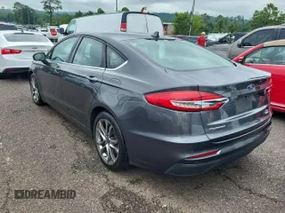 2020 Ford Fusion SEL with VIN 3FA6P0CD7LR197568, listed as a IAAI auction lot 42725343 with 111,304 mi miles and . Bid and sale history available at DreamBid. Image 6.