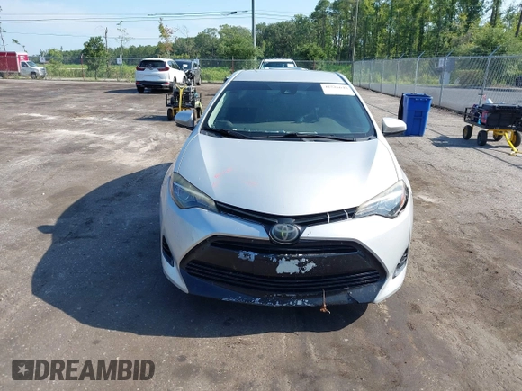 2018 Toyota Corolla L with VIN 5YFBURHEXJP810003, listed as a IAAI auction lot 42526648 with 84,546 mi miles and . Bid and sale history available at DreamBid. Image 13.