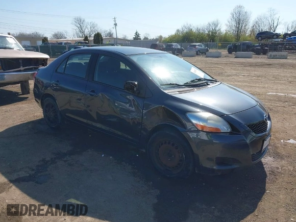 2009 Toyota Yaris with VIN JTDBT903194047784, listed as a IAAI auction lot 42049872 with 115,735 mi miles. Bid and sale history available at carsss.com. Image 1.