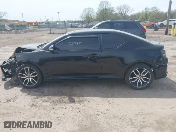 2015 Scion tC z VIN JTKJF5C75FJ012021, wystawiony jako IAAI lot #42143878 z przebiegiem 127 235 mil mil oraz . Historia ofert i sprzedaży dostępna na DreamBid. Obrazek 13.