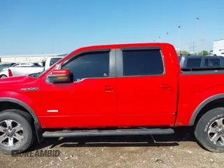 2011 Ford F-150 XLT with VIN 1FTFW1ET5BFC42624, listed as a IAAI auction lot 41853696 with 230,074 mi miles and . Bid and sale history available at DreamBid. Image 14.