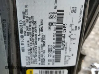 2016 Ford Fusion Titanium Hybrid z VIN 3FA6P0RU6GR139495, wystawiony jako Copart lot #52381235 z przebiegiem 138 534 mil mil oraz Czysty tytuł • Clean title. Historia ofert i sprzedaży dostępna na DreamBid. Obrazek 14.