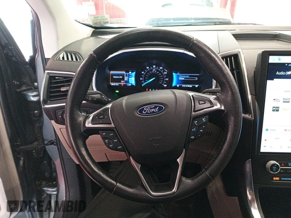 2021 Ford Edge Titanium with VIN 2FMPK4K95MBA50355, listed as a IAAI auction lot 42821253 with 109,191 mi miles and . Bid and sale history available at DreamBid. Image 34.