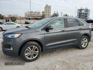 2020 Ford Edge SEL z VIN 2FMPK3J95LBB45573, wystawiony jako Copart lot #56361095 z przebiegiem 207 157 mil mil oraz Czysty tytuł • Clean title. Historia ofert i sprzedaży dostępna na DreamBid. Obrazek 1.