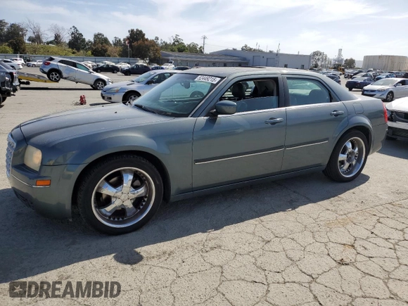 2005 Chrysler 300 with VIN 2C3AA53G65H123302, listed as a Copart auction lot 52449215 with 201,650 mi miles and Clean Title. Bid and sale history available at carsss.com. Image 1.