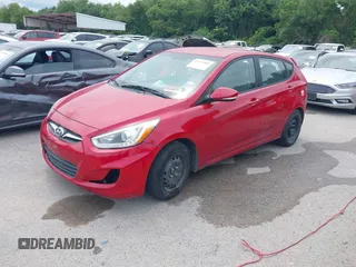 2014 Hyundai Accent SE z VIN KMHCU5AE7EU145704, wystawiony jako IAAI lot #42357042 z przebiegiem 96 773 mil mil oraz . Historia ofert i sprzedaży dostępna na DreamBid. Obrazek 2.