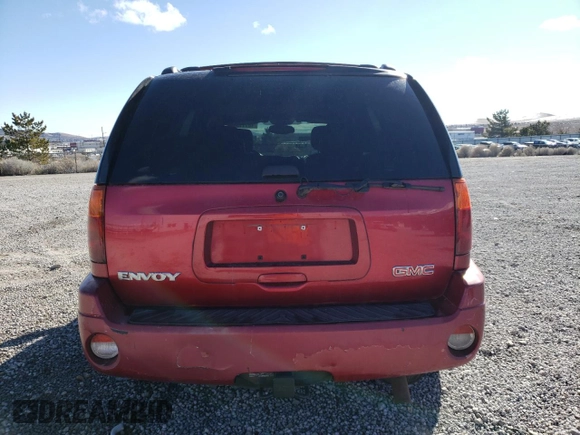 2004 GMC Envoy SLT with VIN 1GKDT13S242417226, listed as a Copart auction lot 46111865 with 375,450 mi miles and Salvage Title. Bid and sale history available at DreamBid. Image 6.