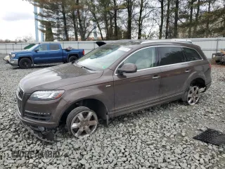 2015 Audi Q7 3.0T Premium Plus with VIN WA1LGAFE2FD013233, listed as a Copart auction lot 50936115 with 82,586 mi miles and Salvage Title. Bid and sale history available at carsss.com. Image 1.