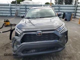 2020 Toyota RAV4 XLE with VIN 2T3W1RFV1LC034366, listed as a Copart auction lot 61774875 with 77,335 mi miles and Salvage title. Bid and sale history available at DreamBid. Image 5.