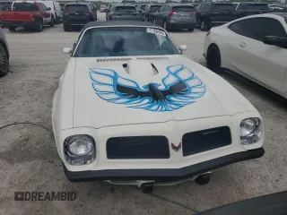 1974 Pontiac Firebird z VIN 2V87X4N121706, wystawiony jako Copart lot #77156494 z przebiegiem 2359 mil mil oraz Nie do naprawy. Historia ofert i sprzedaży dostępna na DreamBid. Obrazek 5.