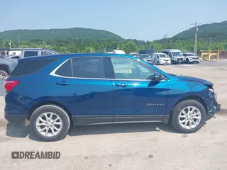 2019 Chevrolet Equinox LT z VIN 2GNAXUEV6K6298440, wystawiony jako IAAI lot #42371287 z przebiegiem 47 041 mil mil oraz . Historia ofert i sprzedaży dostępna na DreamBid. Obrazek 13.
