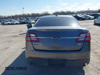2013 Ford Taurus SEL z VIN 1FAHP2H83DG231000, wystawiony jako IAAI lot #41986420 z przebiegiem 200 390 mil mil oraz . Historia ofert i sprzedaży dostępna na DreamBid. Obrazek 16.