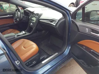 2019 Ford Fusion Energi Titanium with VIN 3FA6P0SU0KR111372, listed as a IAAI auction lot 41685702 with 107,407 mi miles. Bid and sale history available at carsss.com. Image 5.
