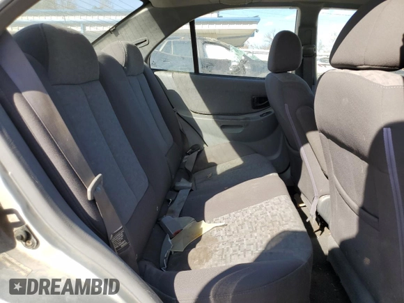 2005 Hyundai Accent GLS with VIN KMHCG45C75U638812, listed as a Copart auction lot 77968234 with 130,815 mi miles and Salvage Title. Bid and sale history available at carsss.com. Image 10.