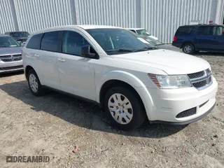 2015 Dodge Journey American Value Pkg with VIN 3C4PDCAB8FT605870, listed as a IAAI auction lot 41930474 with 205,741 mi miles. Bid and sale history available at carsss.com. Image 1.