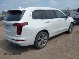 2022 Cadillac XT6 Premium Luxury with VIN 1GYKPCRS2NZ161800, listed as a IAAI auction lot 42174382 with 45,746 mi miles and . Bid and sale history available at DreamBid. Image 4.