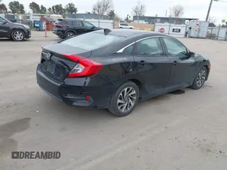 2018 Honda Civic EX with VIN 2HGFC2F75JH583892, listed as a IAAI auction lot 41697605 with 134,675 mi miles and . Bid and sale history available at DreamBid. Image 4.