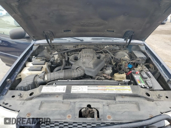 2001 Ford Explorer Sport Trac with VIN 1FMZU67E11UB01604, listed as a Copart auction lot 57581825 with 211,905 mi miles and Salvage title. Bid and sale history available at DreamBid. Image 11.