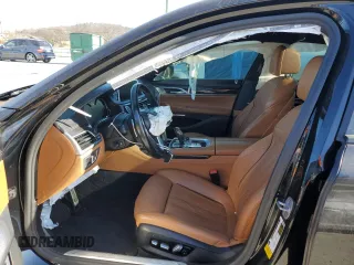 2018 BMW 7 Series 750i with VIN WBA7F0C55JGM23635, listed as a Copart auction lot 83718114 with 0 mi miles and Salvage Title. Bid and sale history available at carsss.com. Image 7.