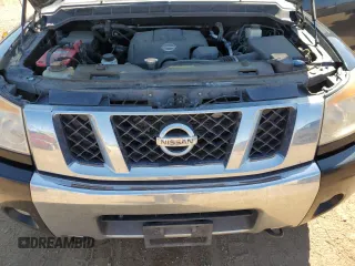 2014 Nissan Titan Pro-4X with VIN 1N6AA0EC2EN519983, listed as a Copart auction lot 71496934 with 150,259 mi miles and Salvage title. Bid and sale history available at DreamBid. Image 11.