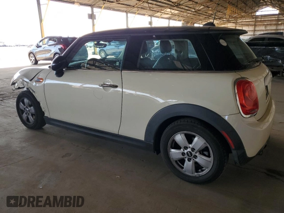 2014 MINI Hardtop with VIN WMWXM5C50ET933486, listed as a Copart auction lot 50823865 with 98,296 mi miles and Salvage Title. Bid and sale history available at DreamBid. Image 2.