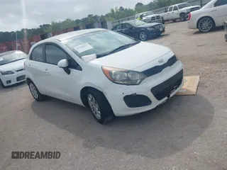 2012 Kia Rio LX with VIN KNADM5A37C6094193, listed as a IAAI auction lot 41940411 with 166,626 mi miles. Bid and sale history available at carsss.com. Image 1.