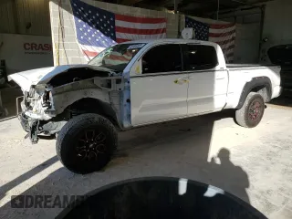 2021 Toyota Tacoma 4WD SR5 with VIN 3TMDZ5BN4MM103311, listed as a Copart auction lot 46486445 with 125,685 mi miles and Salvage Title. Bid and sale history available at carsss.com. Image 1.