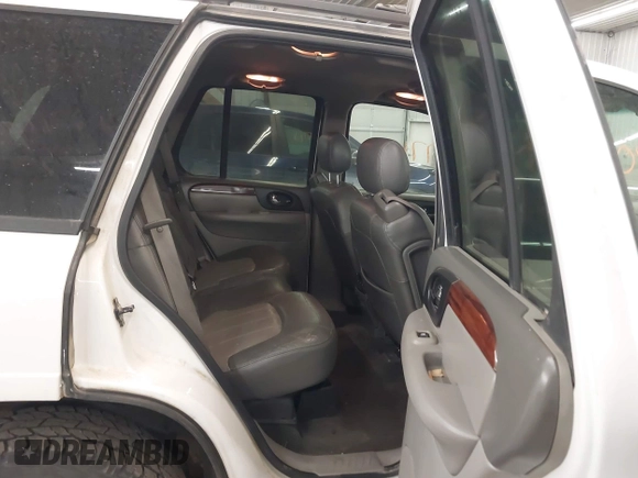 2003 GMC Envoy SLT with VIN 1GKDT13S332222847, listed as a IAAI auction lot 41771052 with 203,699 mi miles. Bid and sale history available at carsss.com. Image 8.