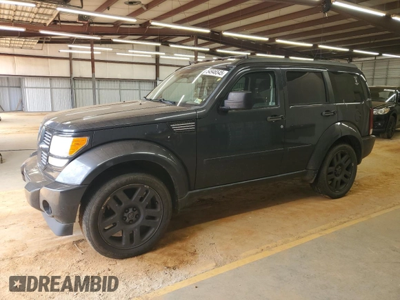 2011 Dodge Nitro Heat with VIN 1D4PU4GK8BW522783, listed as a Copart auction lot 54946545 with 215,804 mi miles and Salvage Title. Bid and sale history available at DreamBid. Image 1.