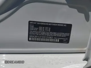 2014 BMW 3 Series 320i with VIN WBA3B1C51EK131063, listed as a IAAI auction lot 42043086 with 92,306 mi miles. Bid and sale history available at carsss.com. Image 9.