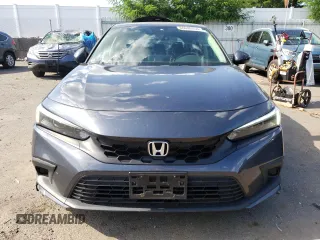 2022 Honda Civic LX z VIN 19XFL2H52NE000724, wystawiony jako Copart lot #60699254 z przebiegiem 63 830 mil mil oraz Szkoda całkowita • Salvage title. Historia ofert i sprzedaży dostępna na DreamBid. Obrazek 5.