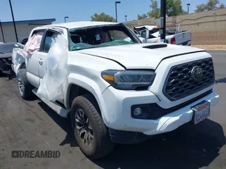 2022 Toyota Tacoma SR5 with VIN 3TMAZ5CN0NM161578, listed as a IAAI auction lot 42430201 with 39,654 mi miles and . Bid and sale history available at DreamBid. Image 1.