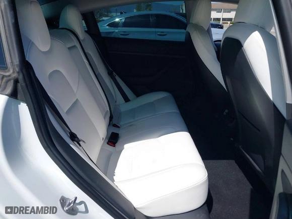 2022 Tesla Model 3 Performance with VIN 5YJ3E1EC2NF176127, listed as a IAAI auction lot 41807613 with 79,435 mi miles. Bid and sale history available at carsss.com. Image 8.