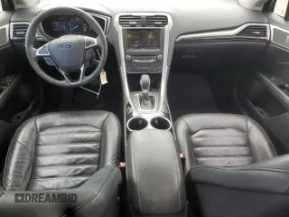 2013 Ford Fusion SE Hybrid с VIN 3FA6P0LU2DR181215, выставлен на аукционе Copart как лот 62474965 с пробегом 149 492 миль миль и Списание • Salvage title. История ставок и продаж доступна на DreamBid. Изображение 8.