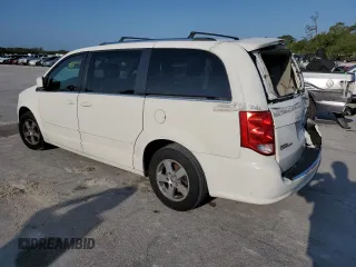 2011 Dodge Grand Caravan Crew with VIN 2D4RN5DG5BR755153, listed as a Copart auction lot 54404625 with 140,307 mi miles and Salvage Title. Bid and sale history available at DreamBid. Image 2.