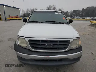 2000 Ford F-150 XL с VIN 1FTZX1725YNB58607, выставлен на аукционе Copart как лот 48706575 с пробегом 286 898 миль миль и Списание • Salvage title. История ставок и продаж доступна на DreamBid. Изображение 5.
