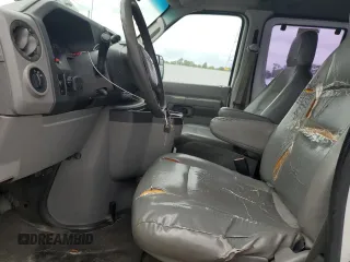 2010 Ford Econoline Passenger XL with VIN 1FBSS3BL2ADA88091, listed as a Copart auction lot 71018604 with 214,293 mi miles and Clean Title. Bid and sale history available at DreamBid. Image 7.